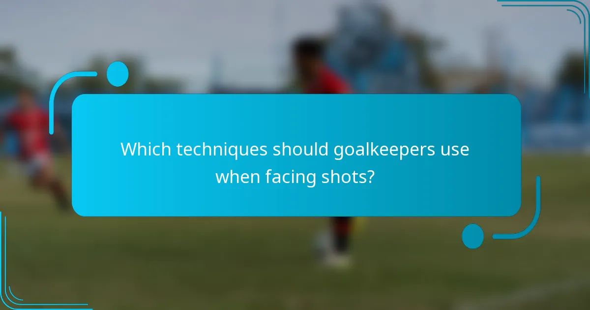 Which techniques should goalkeepers use when facing shots?